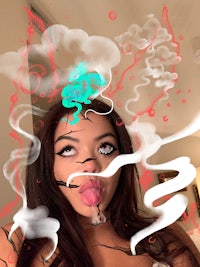 a girl with smoke coming out of her mouth